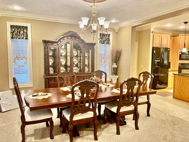 carpeted dining area featuring an inviting chandelier and crown molding