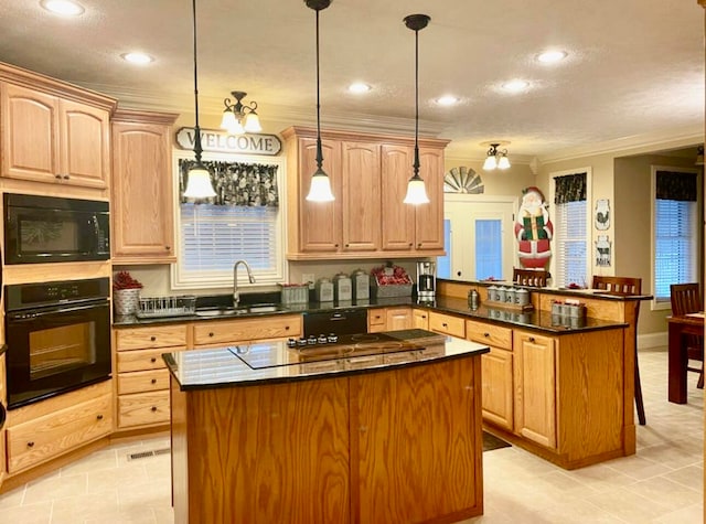 kitchen with black appliances, sink, hanging light fixtures, a kitchen island, and kitchen peninsula