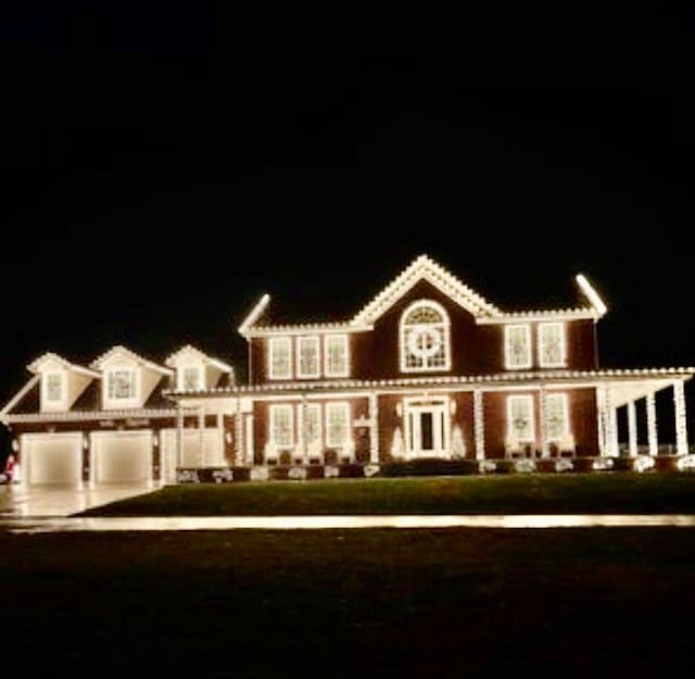 view of front of property featuring a garage