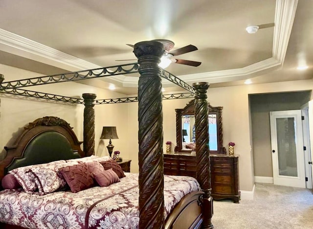 carpeted bedroom with ceiling fan and crown molding