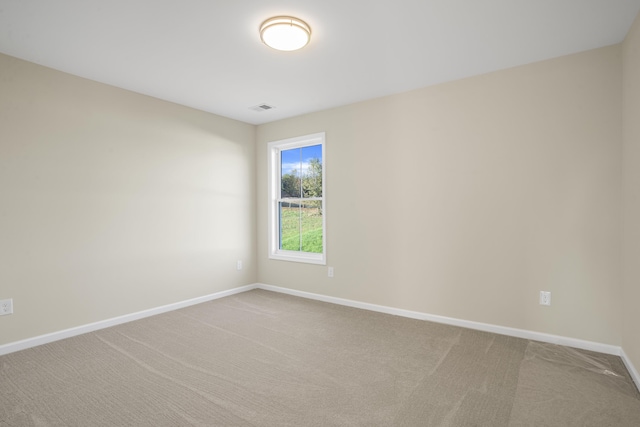 view of carpeted spare room