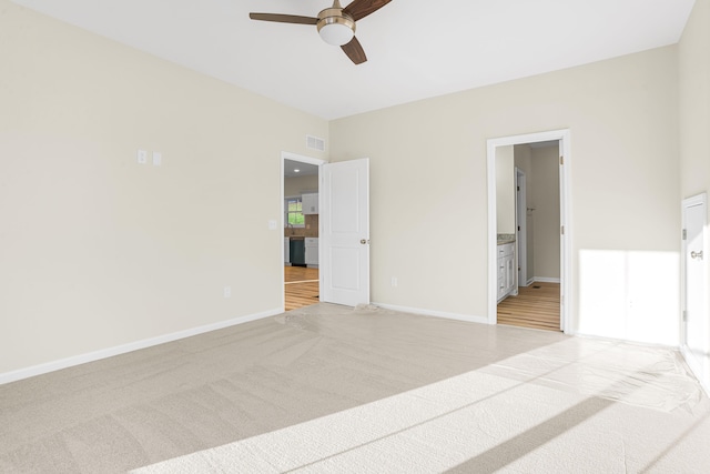 interior space with ceiling fan