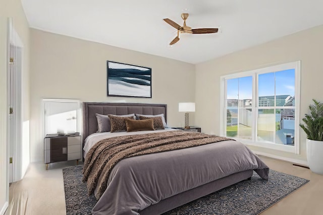 bedroom featuring carpet floors and ceiling fan