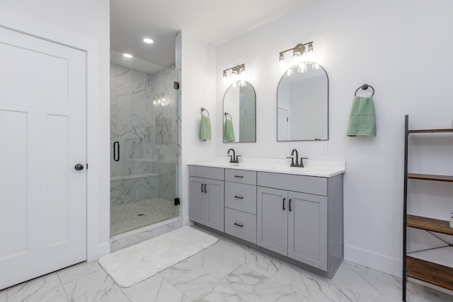 bathroom with vanity and a shower with shower door