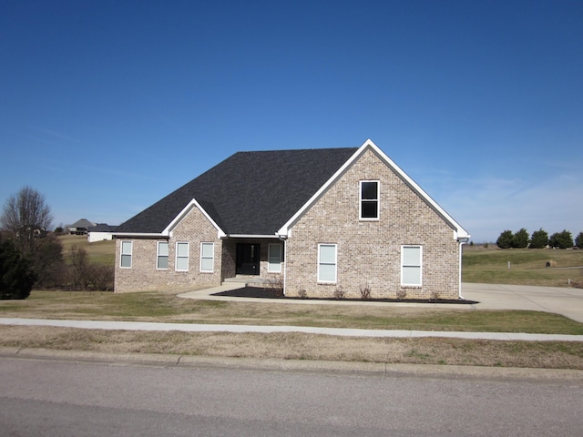 view of front of home with a front yard