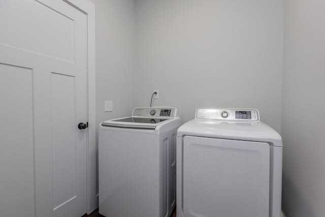 laundry room with independent washer and dryer