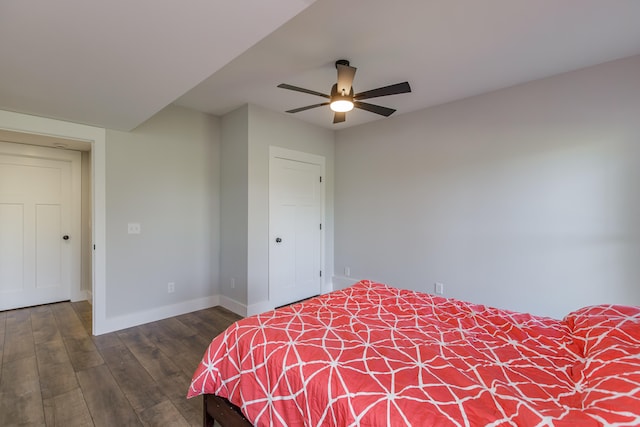 bedroom featuring dark hardwood / wood-style floors and ceiling fan