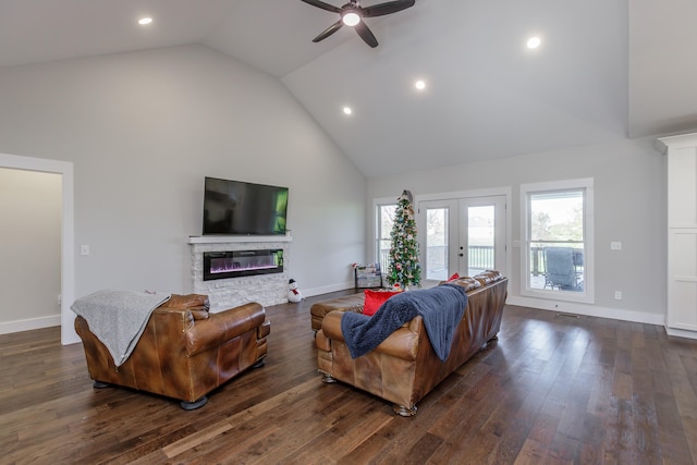 living room featuring ceiling fan, dark wood-type flooring, high vaulted ceiling, and french doors