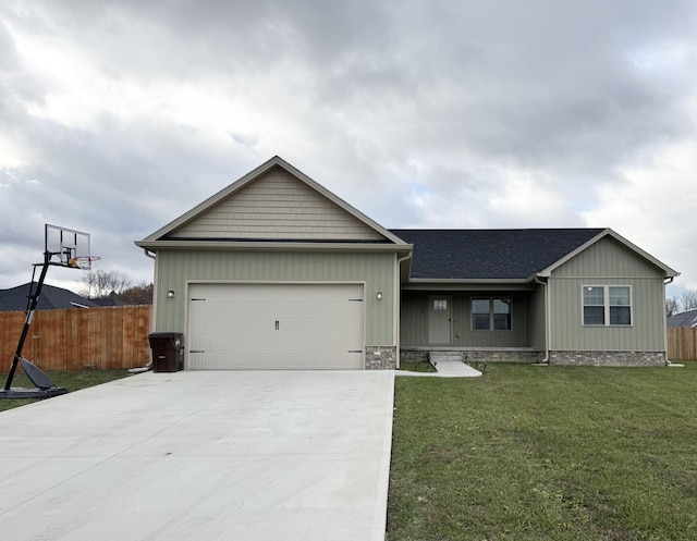 ranch-style house with a front yard and a garage