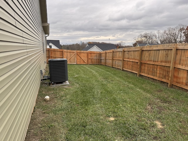 view of yard with central air condition unit