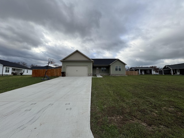 single story home with a garage and a front yard