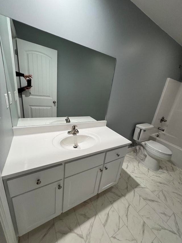 full bathroom featuring shower / bathing tub combination, vanity, and toilet