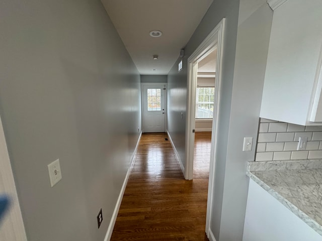 hall featuring dark wood-type flooring