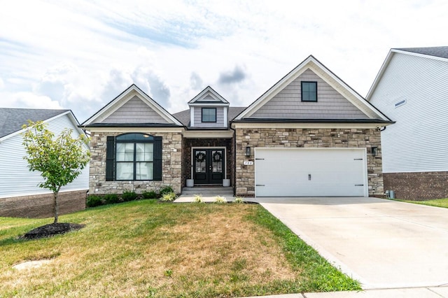 craftsman-style home with a garage and a front lawn