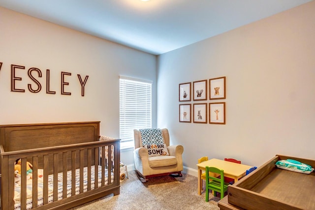 bedroom with a crib and multiple windows