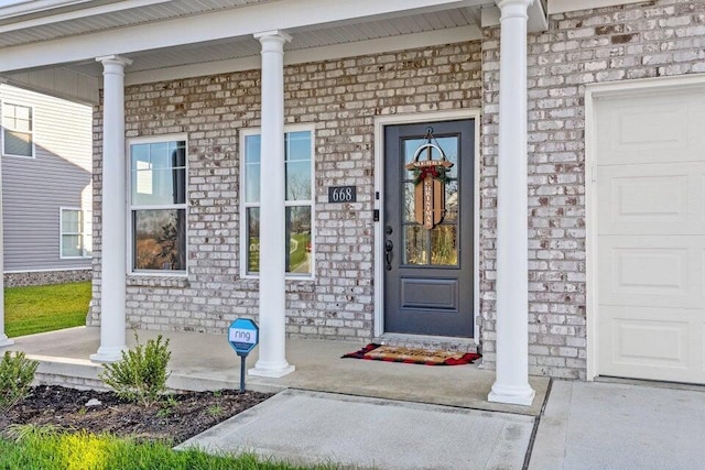 doorway to property featuring a porch