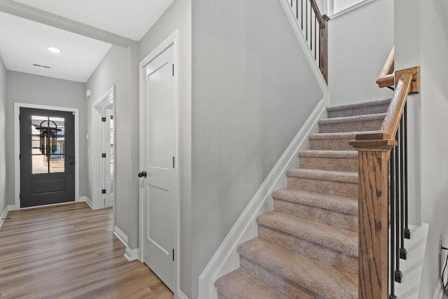 entrance foyer with light hardwood / wood-style floors