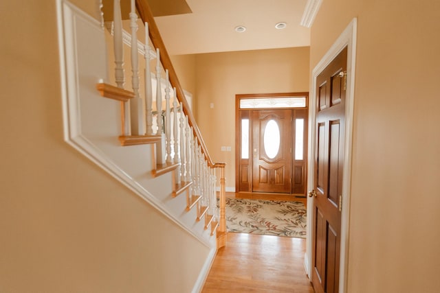 foyer with light hardwood / wood-style floors