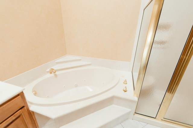 bathroom with tile patterned flooring and plus walk in shower