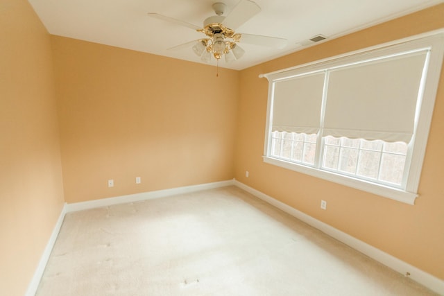 unfurnished room featuring carpet and ceiling fan