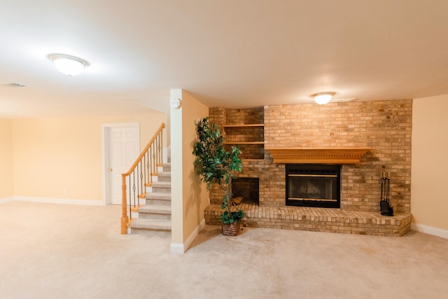 living room featuring carpet and a fireplace