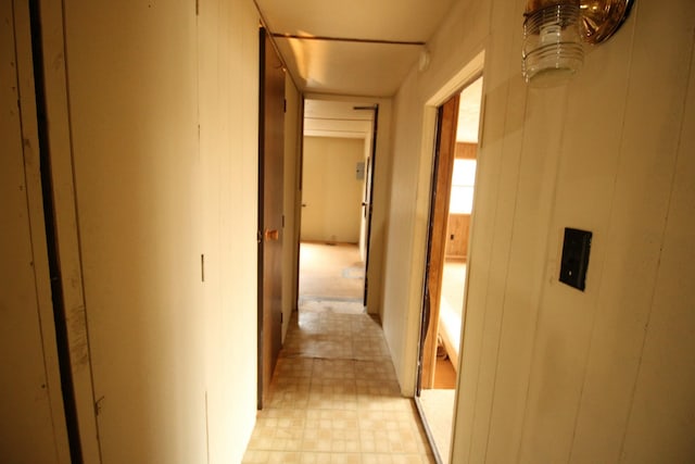 hallway with wooden walls