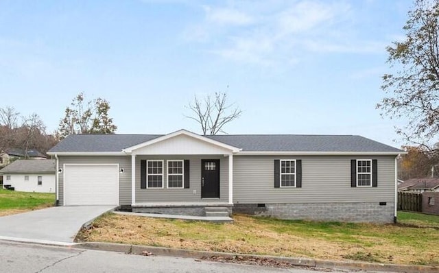 view of front facade featuring a front yard and a garage