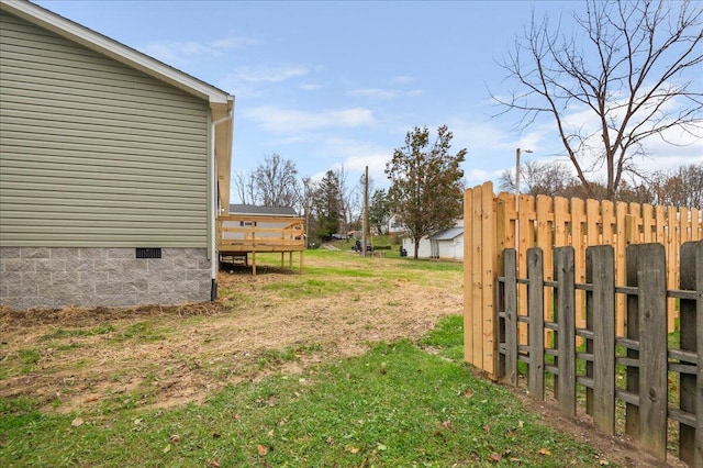 view of yard with a deck