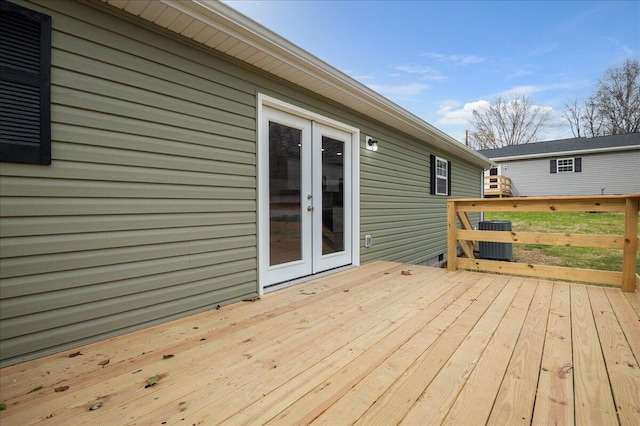 wooden deck with central air condition unit