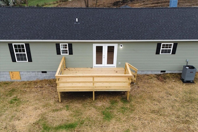 rear view of property featuring central AC, a deck, and french doors