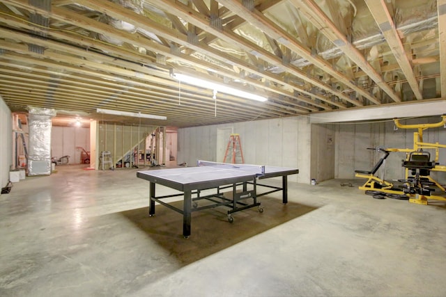 recreation room with concrete floors