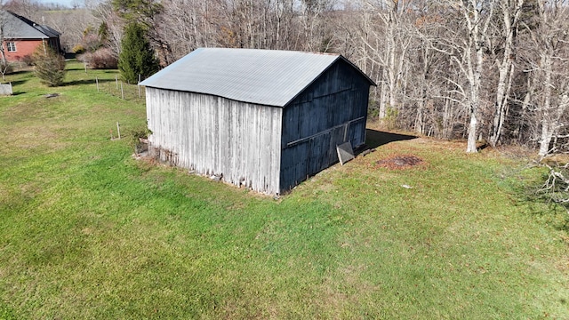 view of outdoor structure featuring a yard