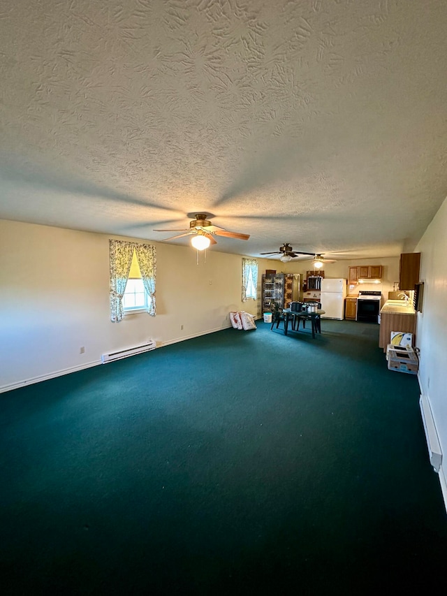 interior space featuring carpet floors, a textured ceiling, and a baseboard radiator