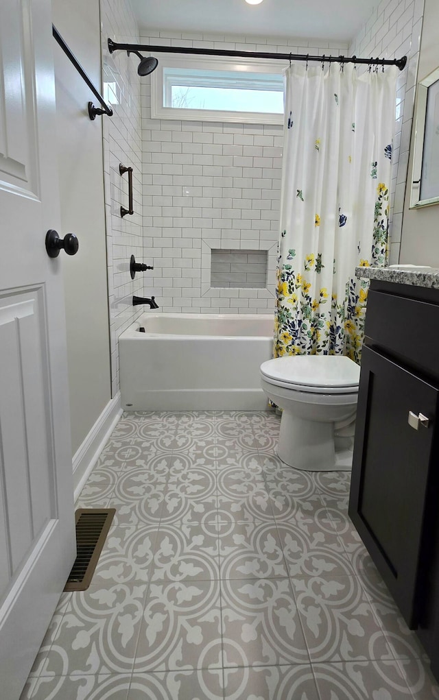 full bathroom with toilet, shower / bath combo with shower curtain, vanity, and tile patterned flooring