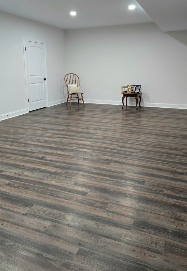 empty room featuring dark wood-type flooring