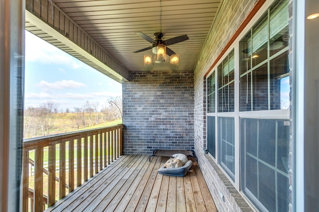 wooden terrace with ceiling fan