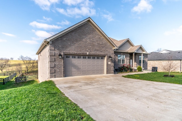 view of front facade featuring a garage and a front lawn