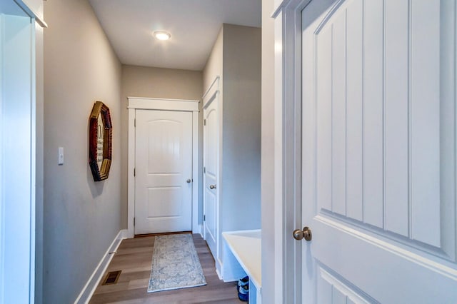 doorway to outside featuring hardwood / wood-style flooring