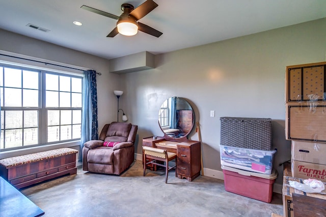 sitting room with ceiling fan