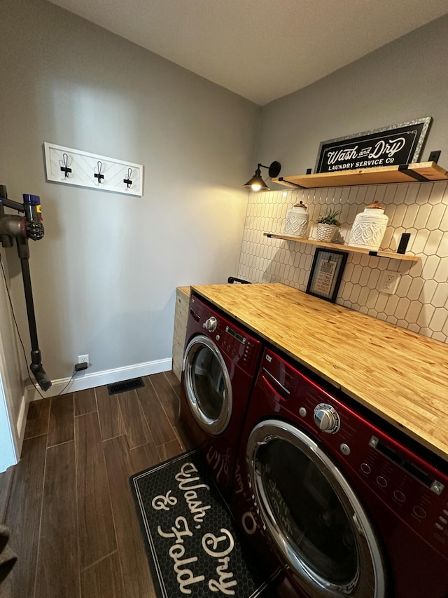 2458 High Bridge Rd, Lancaster, KY 40444 - laundry room featuring washing machine and clothes dryer, wood tiled floors, and baseboards