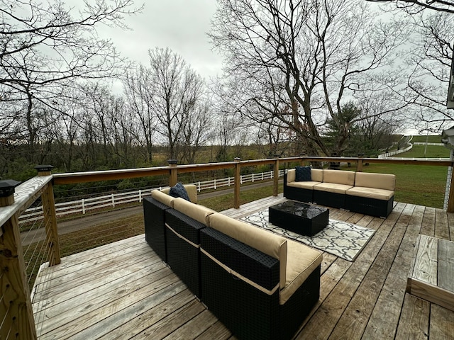 wooden deck with an outdoor living space