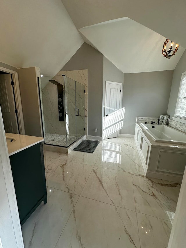 bathroom featuring separate shower and tub, vanity, and lofted ceiling