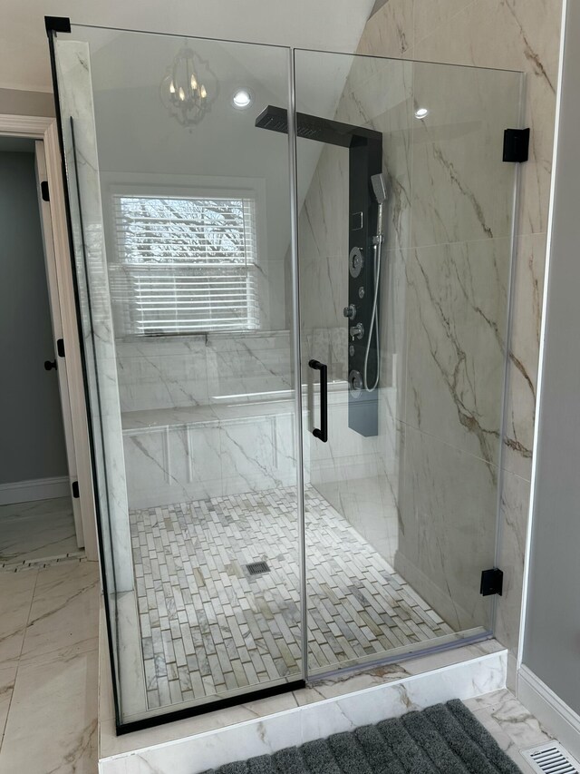 2458 High Bridge Rd, Lancaster, KY 40444 - bathroom with a marble finish shower, marble finish floors, and a chandelier