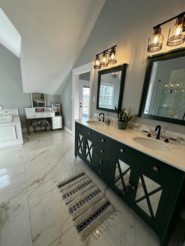 bathroom with vanity, lofted ceiling, and walk in shower