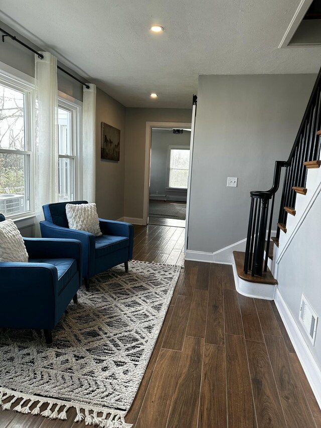 2458 High Bridge Rd, Lancaster, KY 40444 - living area featuring dark wood-style floors, baseboards, recessed lighting, stairs, and a textured ceiling