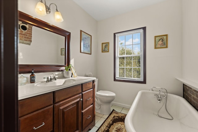 bathroom featuring a tub to relax in, tile patterned flooring, vanity, and toilet