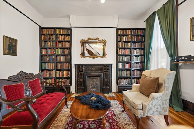 living area with wood-type flooring