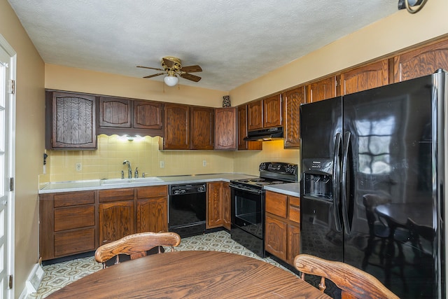 kitchen with backsplash, ventilation hood, ceiling fan, sink, and black appliances