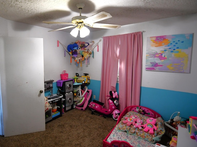 bedroom featuring carpet flooring, ceiling fan, and a textured ceiling