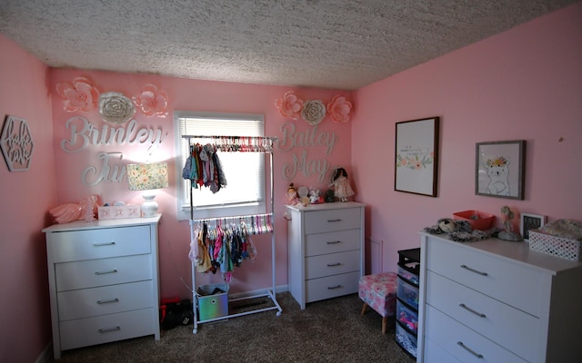 carpeted bedroom with a textured ceiling